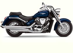 Ein blaues Motorrad mit chromfarbenen Akzenten steht seitlich abgebildet und repräsentiert die Auswahl von Zweirad Laux, einem Motorradhändler für verschiedene Marken.